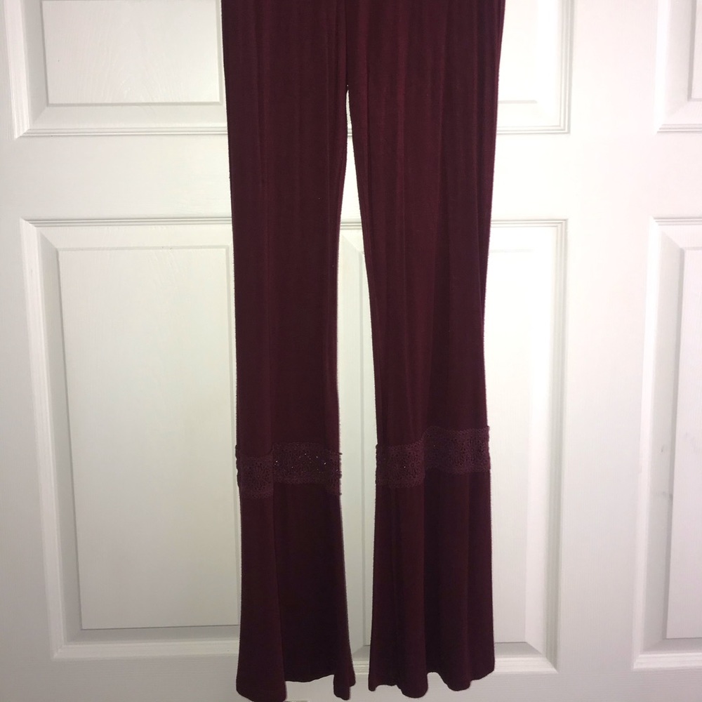 Red bell bottom lace pants